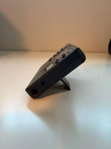 Korg TM-50 propped up on its kickstand